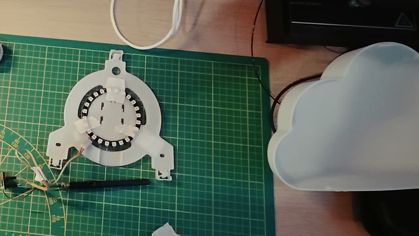 The prototype: the LED ring on a 3D-printed carrier with jumper wires, next to the original cloud diffuser